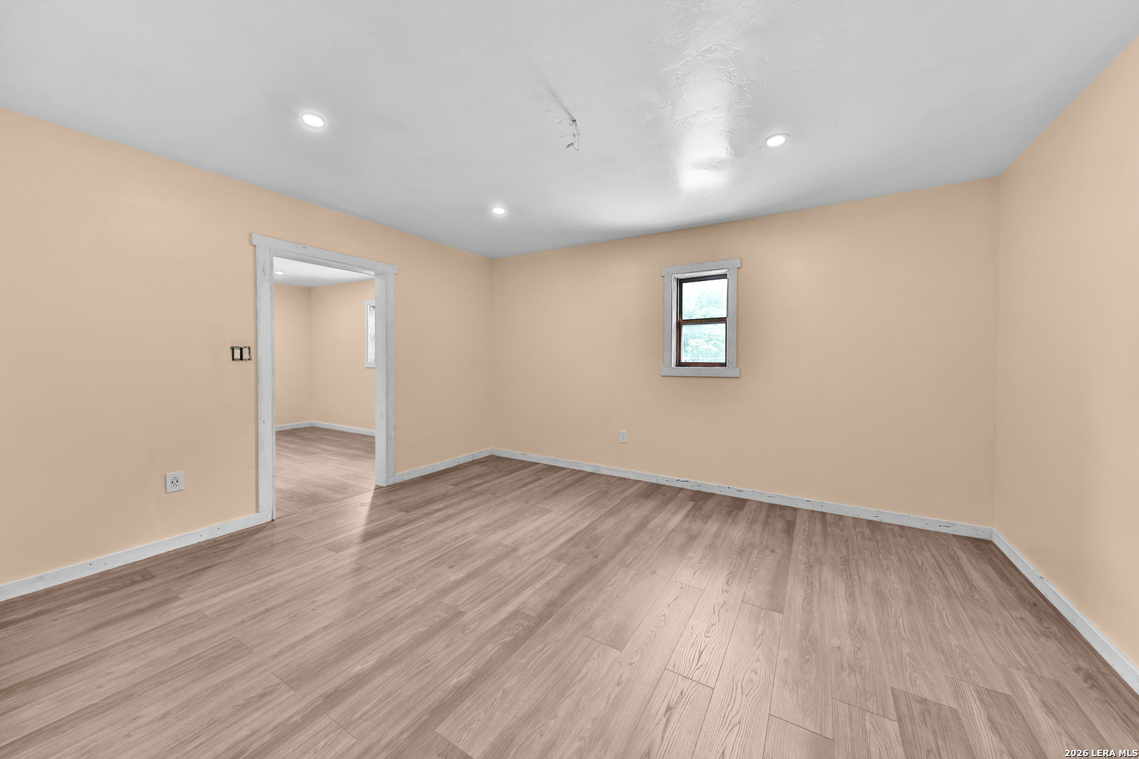 122 Brink Center Point, TX 78010 - Photo 31 of 40 an empty room with wooden floor and windows