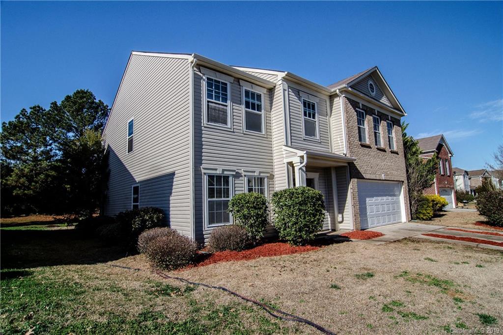 14232 Luscombe Farm Road Charlotte, NC 28278 - Photo 2 of 29 a front view of a house with a yard