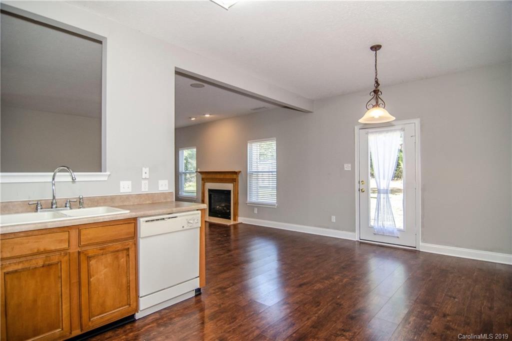 14232 Luscombe Farm Road Charlotte, NC 28278 - Photo 13 of 29 a kitchen with sink and cabinets