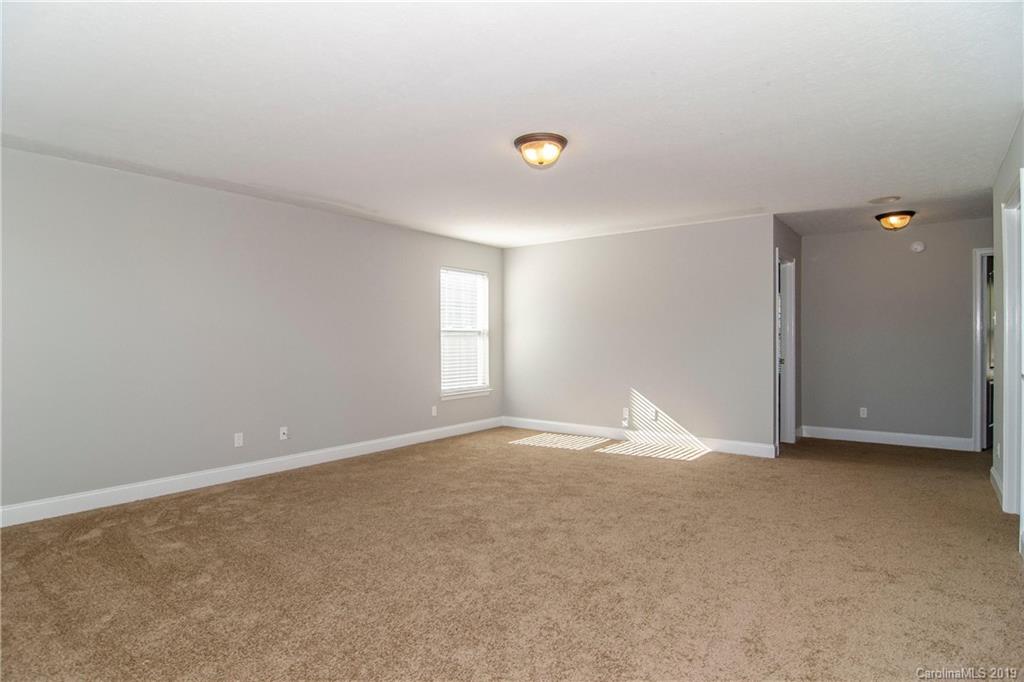 14232 Luscombe Farm Road Charlotte, NC 28278 - Photo 17 of 29 a view of an empty room with a window