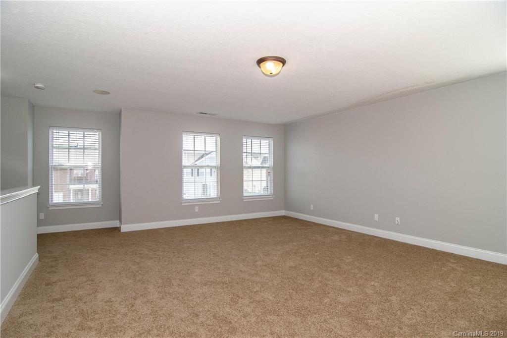 14232 Luscombe Farm Road Charlotte, NC 28278 - Photo 18 of 29 an empty room with windows