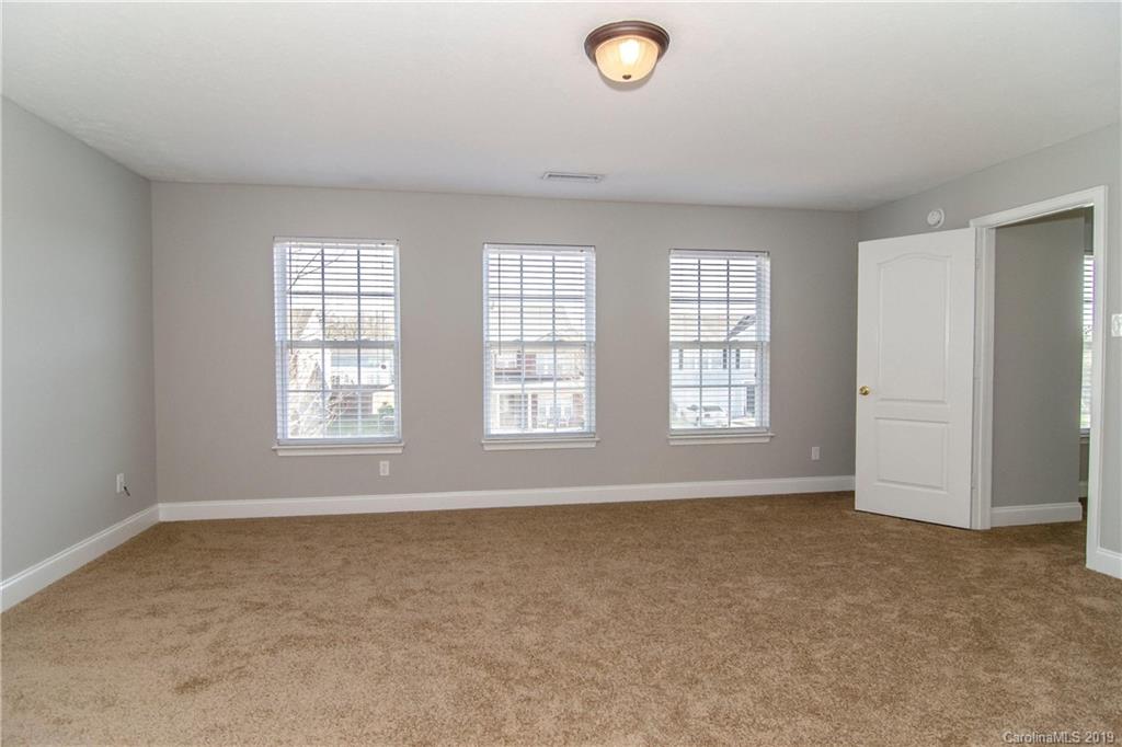 14232 Luscombe Farm Road Charlotte, NC 28278 - Photo 19 of 29 an empty room with windows