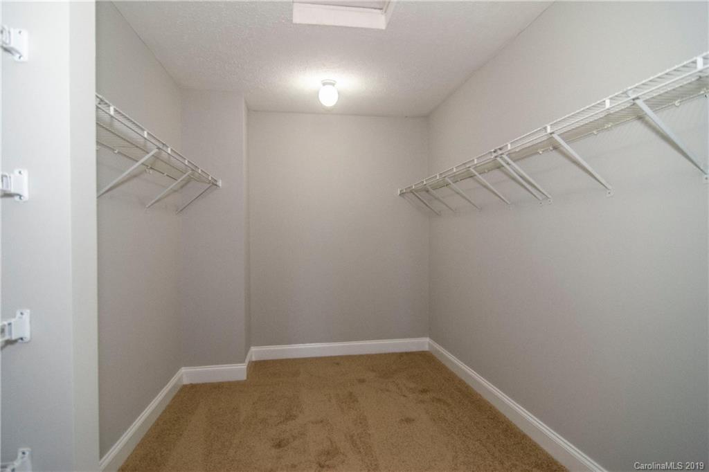 14232 Luscombe Farm Road Charlotte, NC 28278 - Photo 22 of 29 a view of a room with racks on the wall