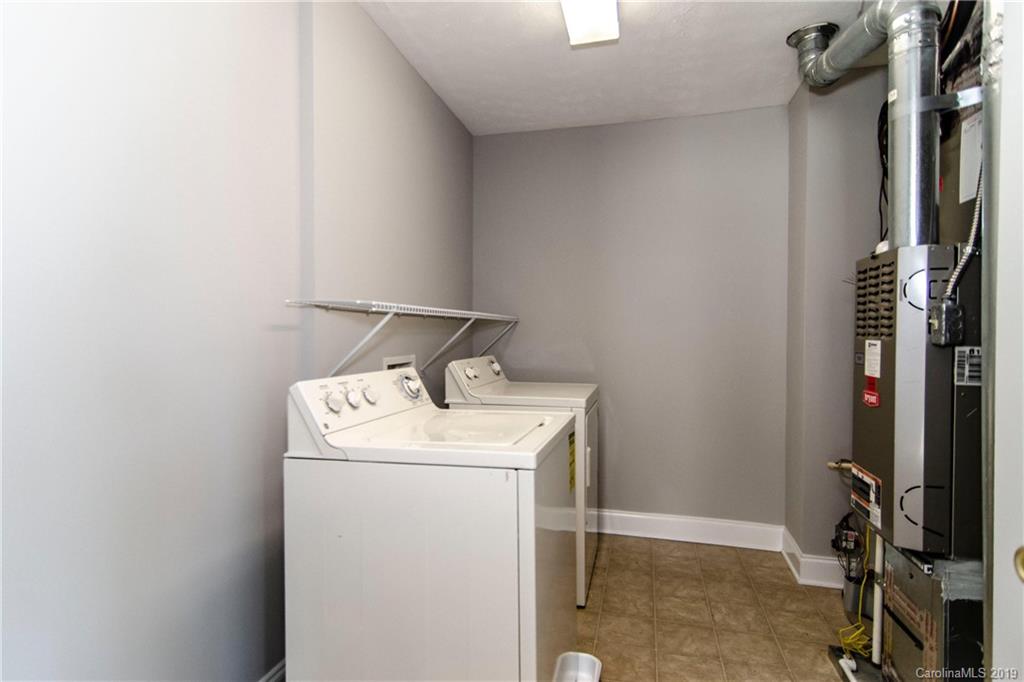 14232 Luscombe Farm Road Charlotte, NC 28278 - Photo 27 of 29 a utility room with dryer and washer