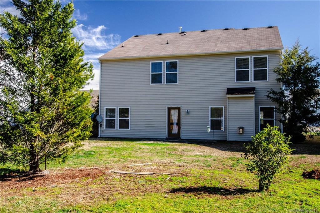 14232 Luscombe Farm Road Charlotte, NC 28278 - Photo 28 of 29 a house view with a garden space
