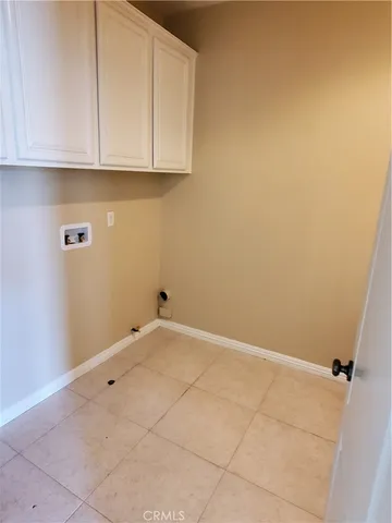 a view of a room with cabinets