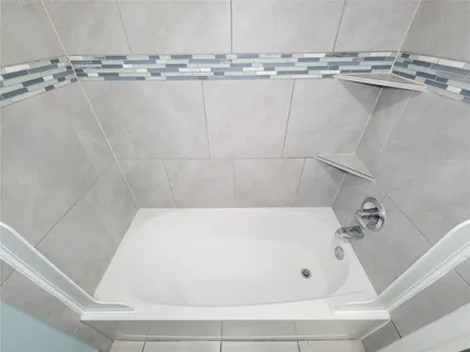 a bathroom with a bathtub