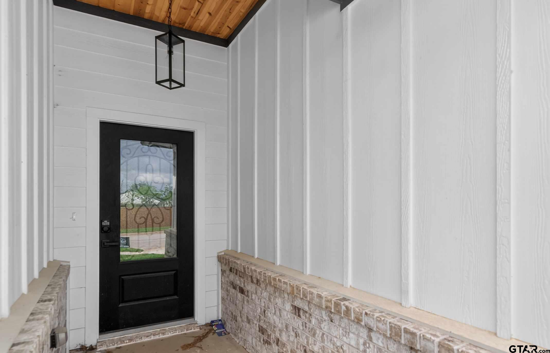 3045 Guinn Farms Road Tyler, TX 75707 - Photo 4 of 45 a view of entryway with window