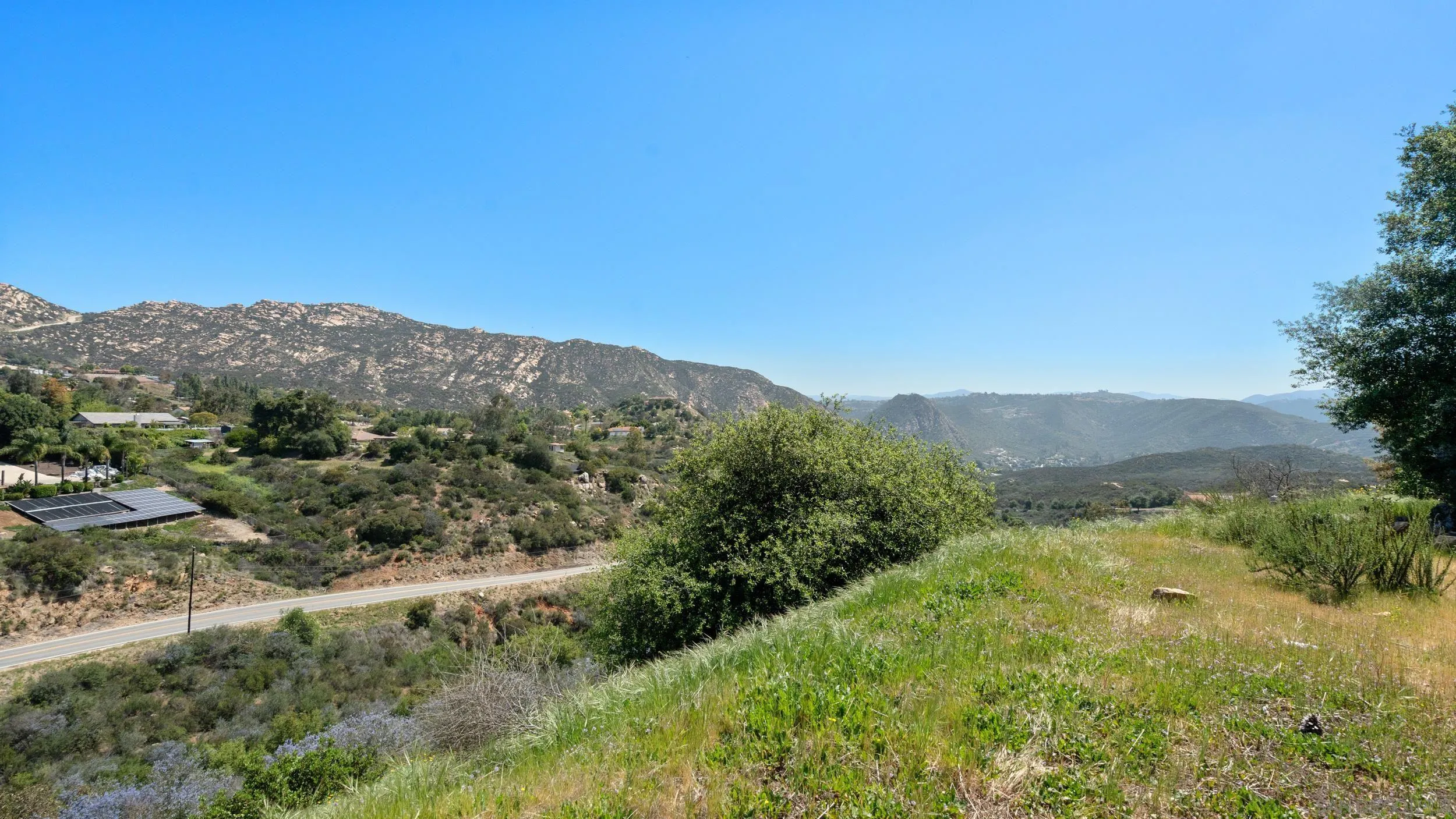 1140 Old Mountain View Road El Cajon, CA 92021 - Photo 24 of 25 a view of a mountain range with lush green forest