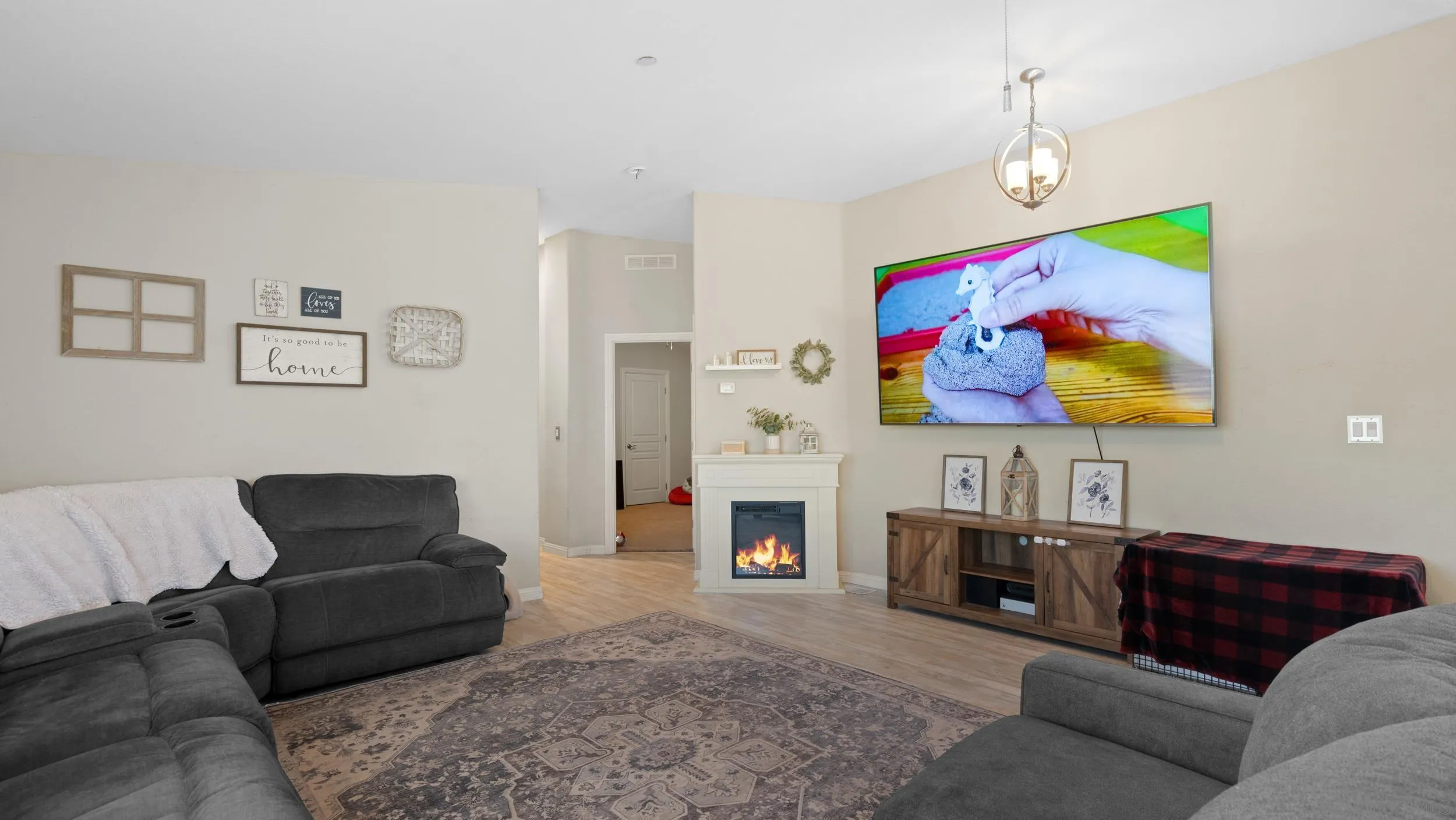 1140 Old Mountain View Road El Cajon, CA 92021 - Photo 7 of 25 a living room with furniture and a flat screen tv