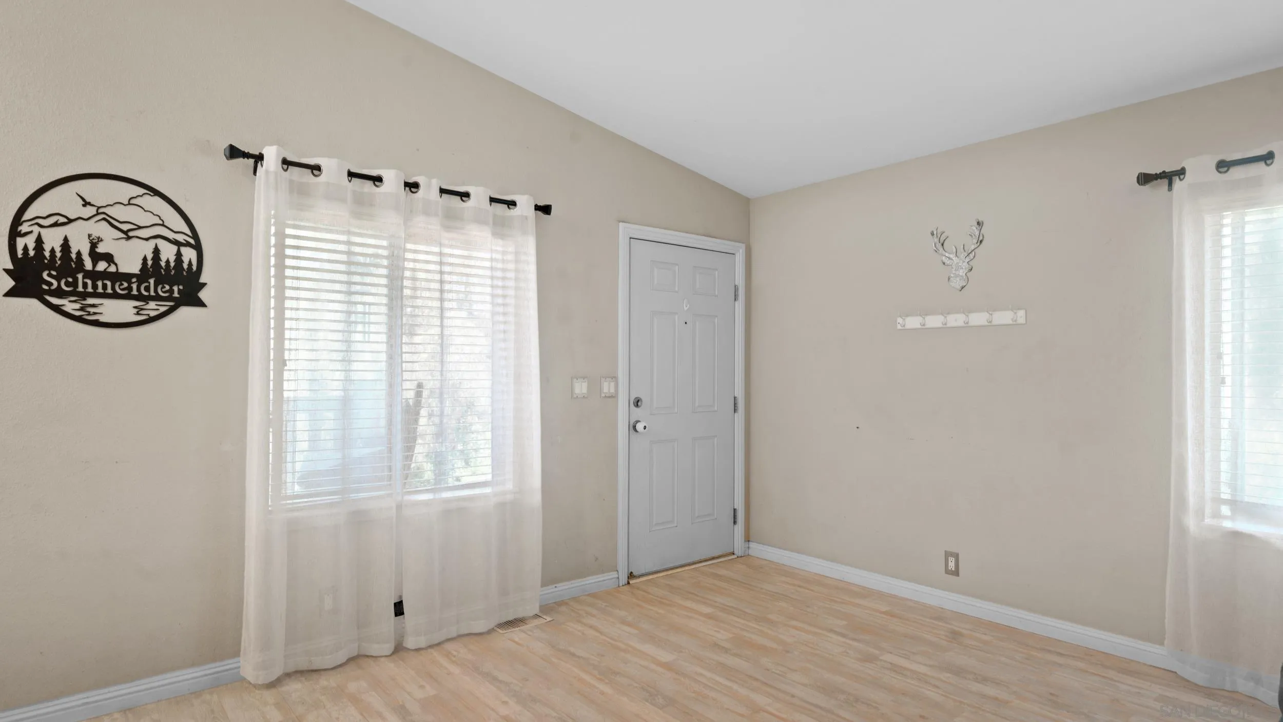 1140 Old Mountain View Road El Cajon, CA 92021 - Photo 9 of 25 a view of a room with rack on the wall