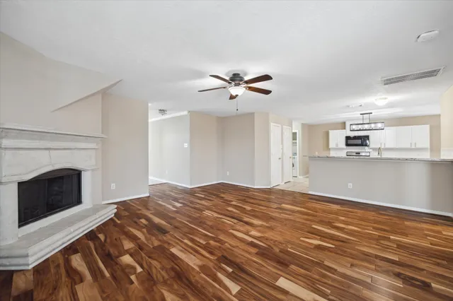 a bedroom with a bed and a fireplace