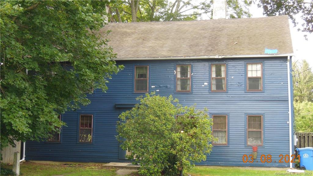 5 Tatnic Road Brooklyn, CT 06234 - Photo 1 of 1 a brick house with a yard plants and large tree
