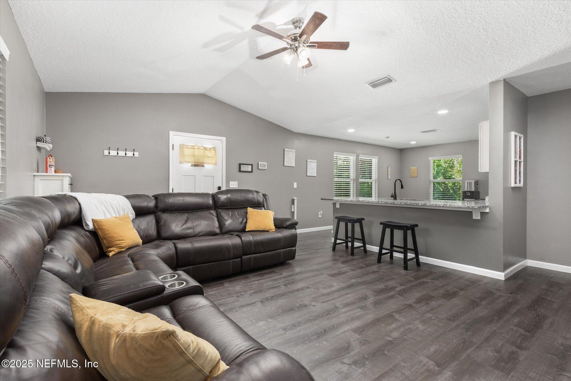 3615 Weaver Road Palatka, FL 32177 - Photo 12 of 30 a living room with furniture and a table