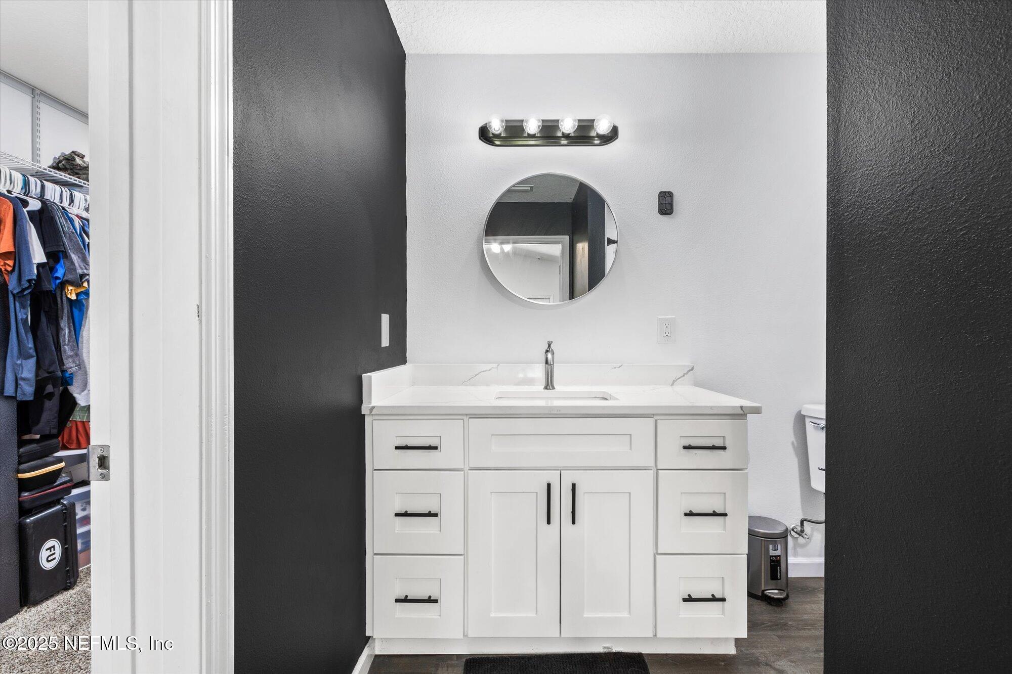 3615 Weaver Road Palatka, FL 32177 - Photo 17 of 30 a bathroom with a sink and a mirror