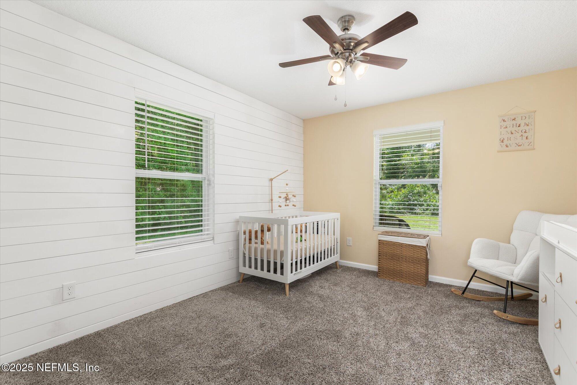 3615 Weaver Road Palatka, FL 32177 - Photo 20 of 30 a bed room with a bed and a window