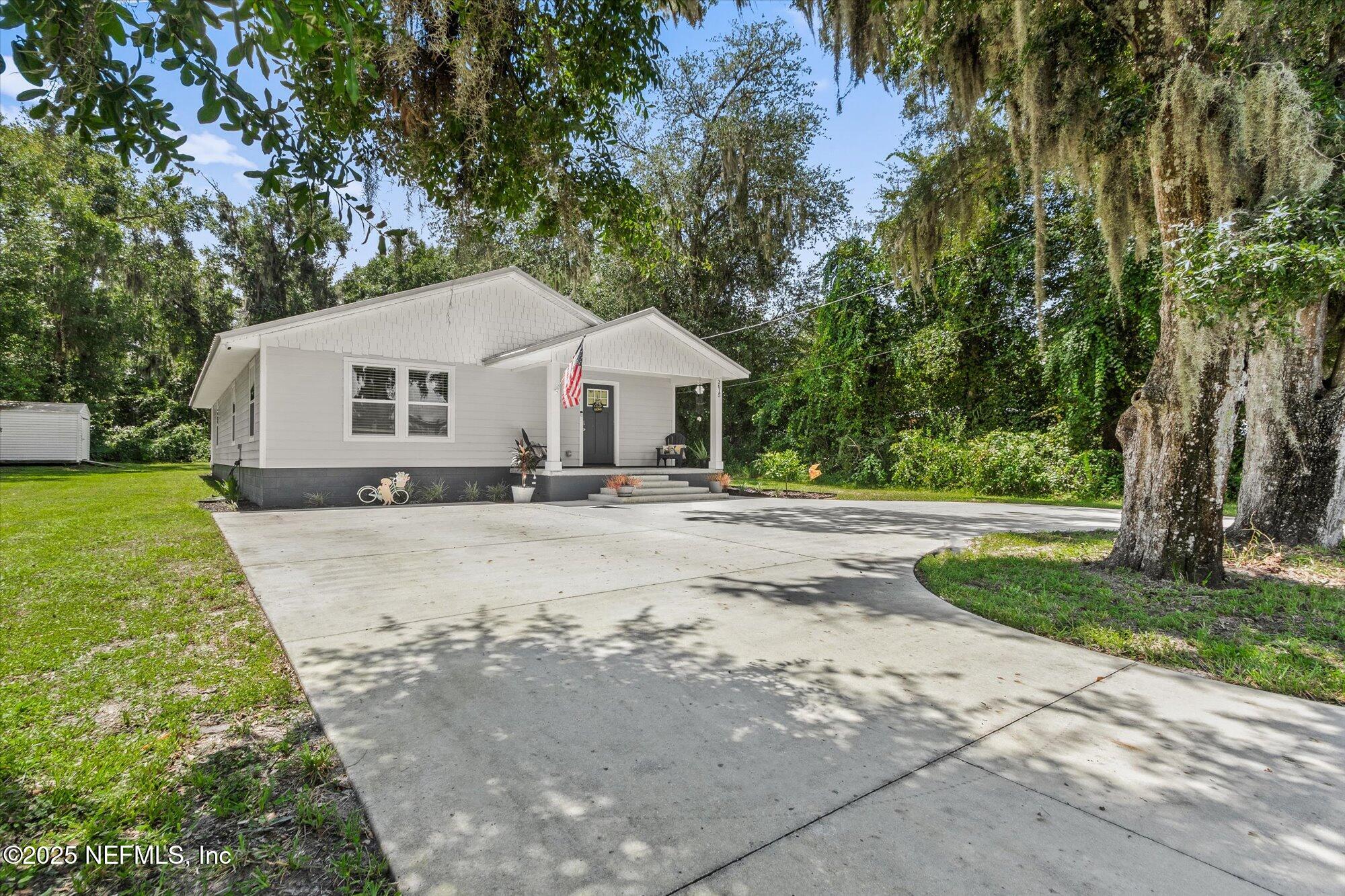 3615 Weaver Road Palatka, FL 32177 - Photo 30 of 30 a front view of house with yard and green space