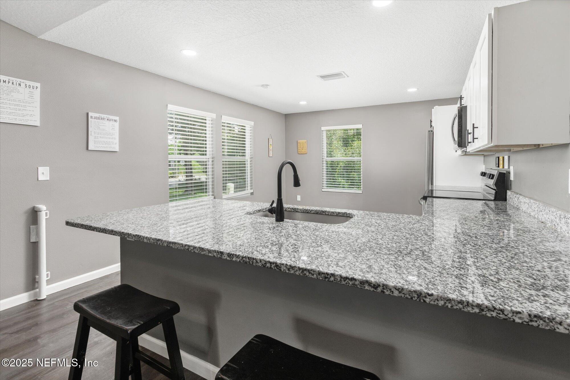3615 Weaver Road Palatka, FL 32177 - Photo 9 of 30 a kitchen with sink and window