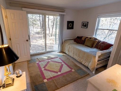 26 Fishermans Road Truro, MA 02666 - Photo 12 of 29 a bedroom with furniture and a window