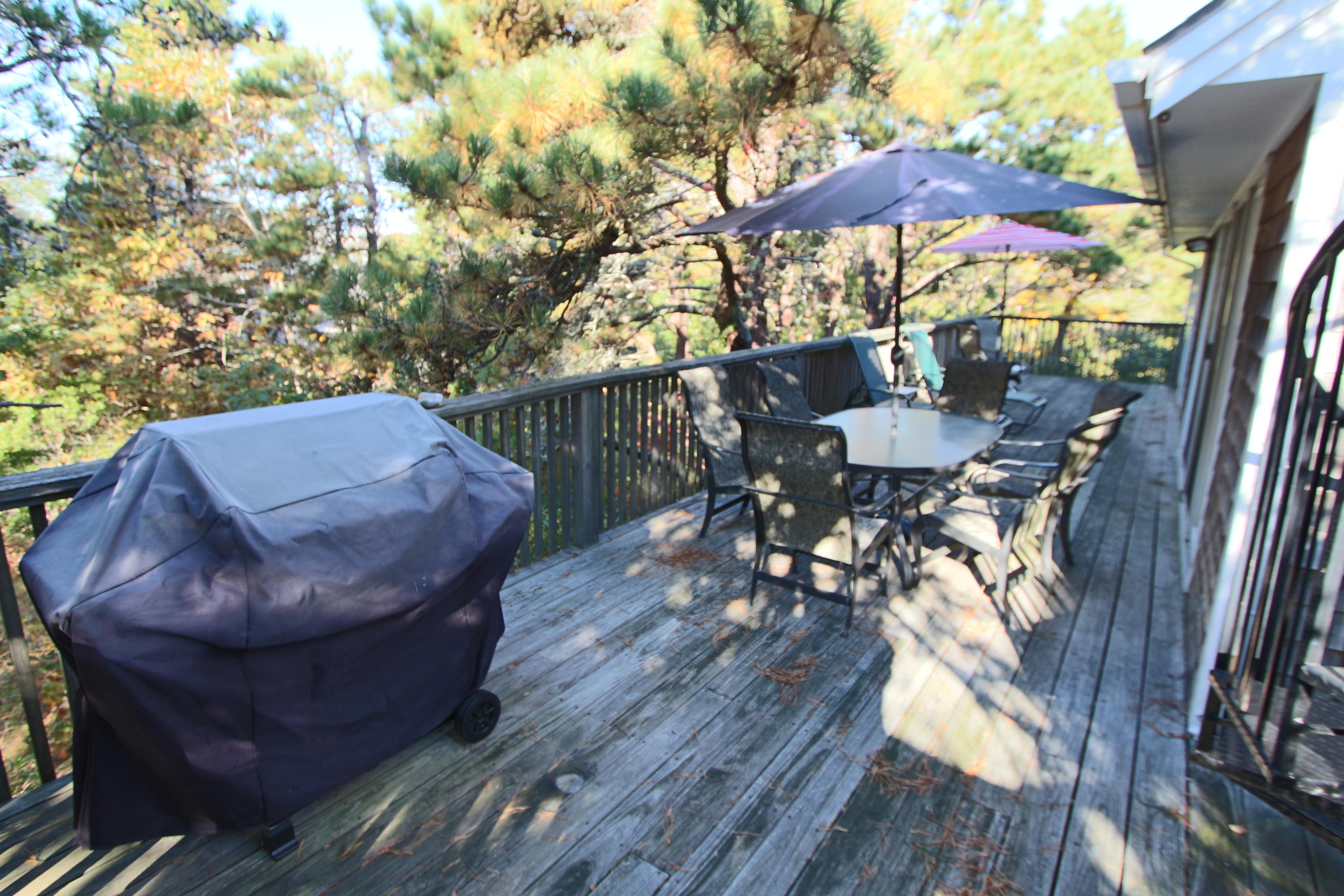 26 Fishermans Road Truro, MA 02666 - Photo 15 of 29 a view of outdoor sitting area with furniture and wooden floor