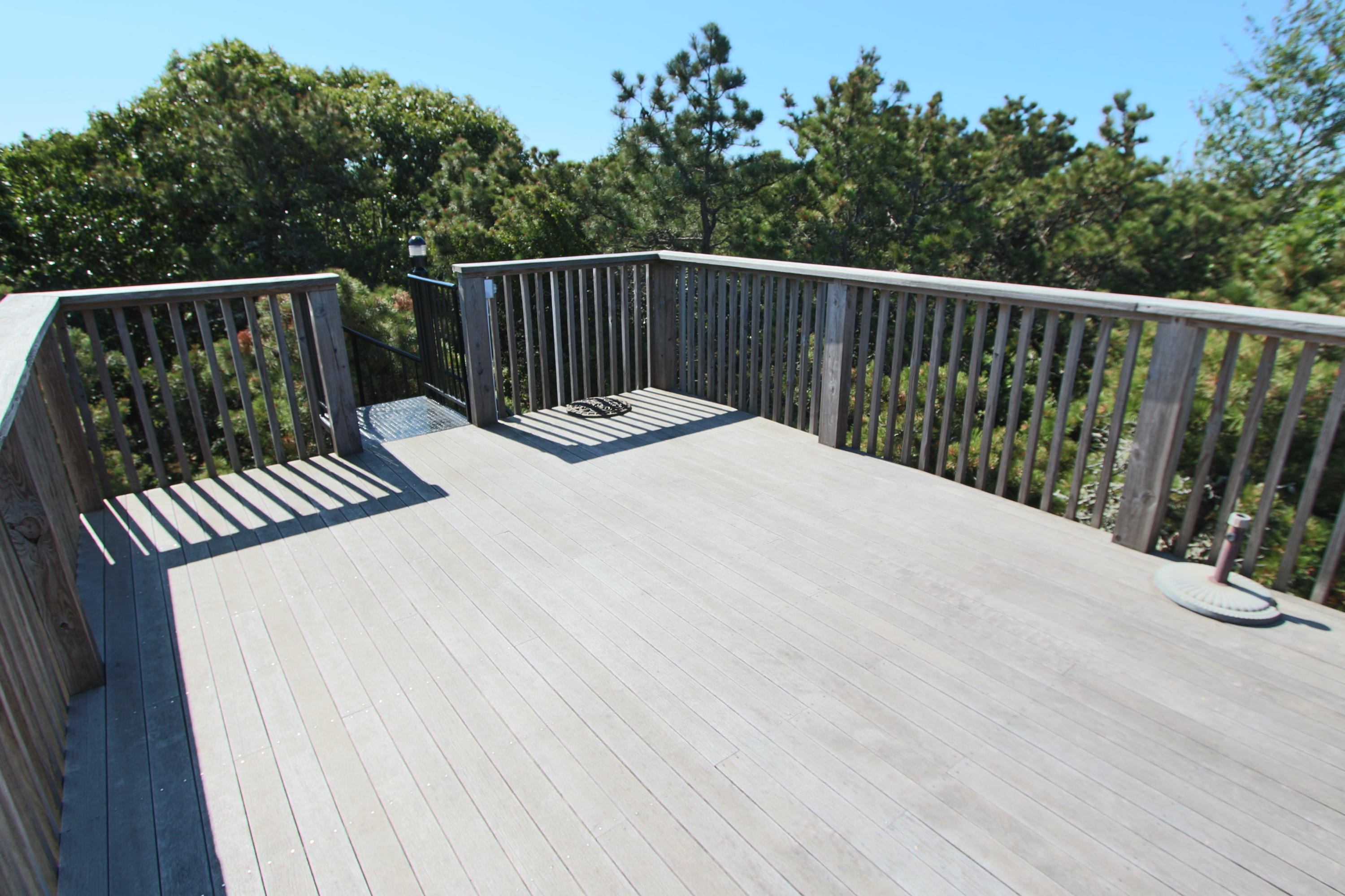 26 Fishermans Road Truro, MA 02666 - Photo 18 of 29 a view of balcony with wooden floor and fence