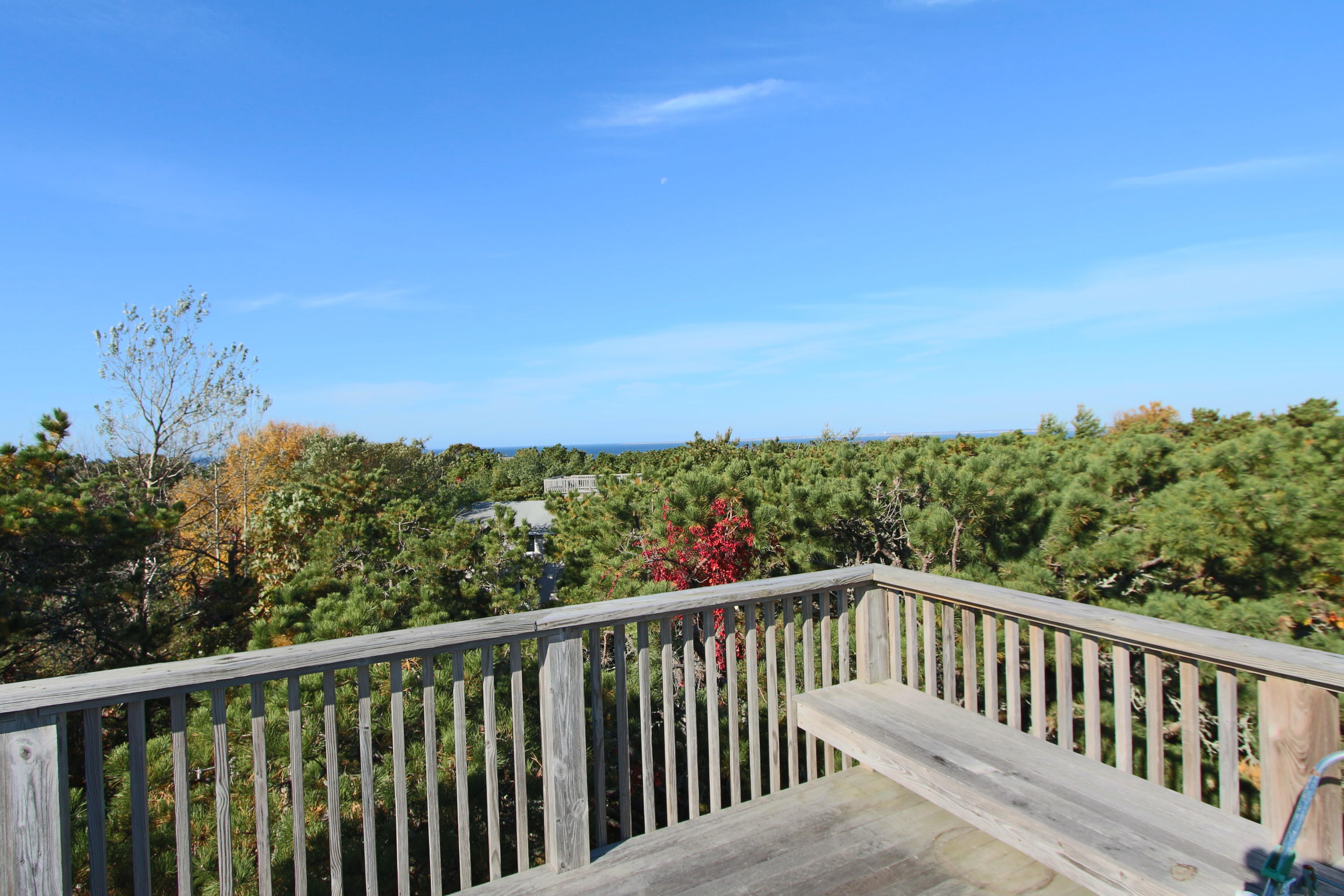 26 Fishermans Road Truro, MA 02666 - Photo 19 of 29 a view of a balcony with wooden fence