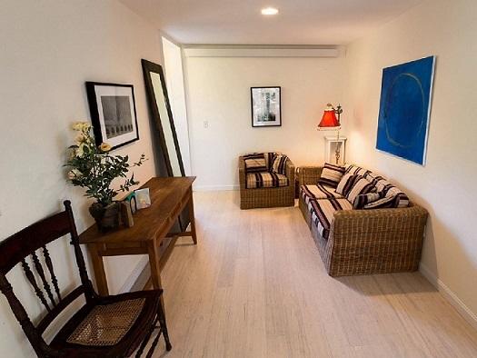 26 Fishermans Road Truro, MA 02666 - Photo 5 of 29 a living room with furniture rug and wooden floor