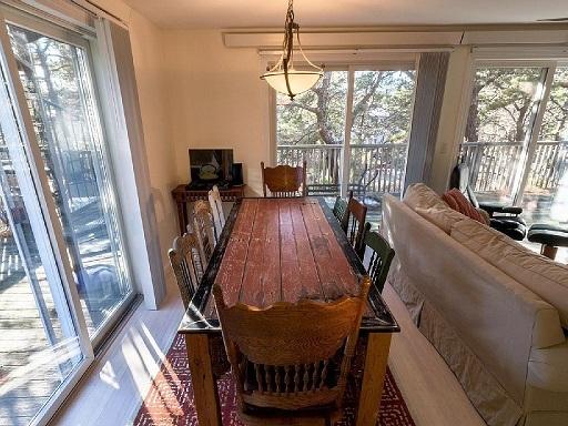26 Fishermans Road Truro, MA 02666 - Photo 7 of 29 a view of a room with furniture and windows