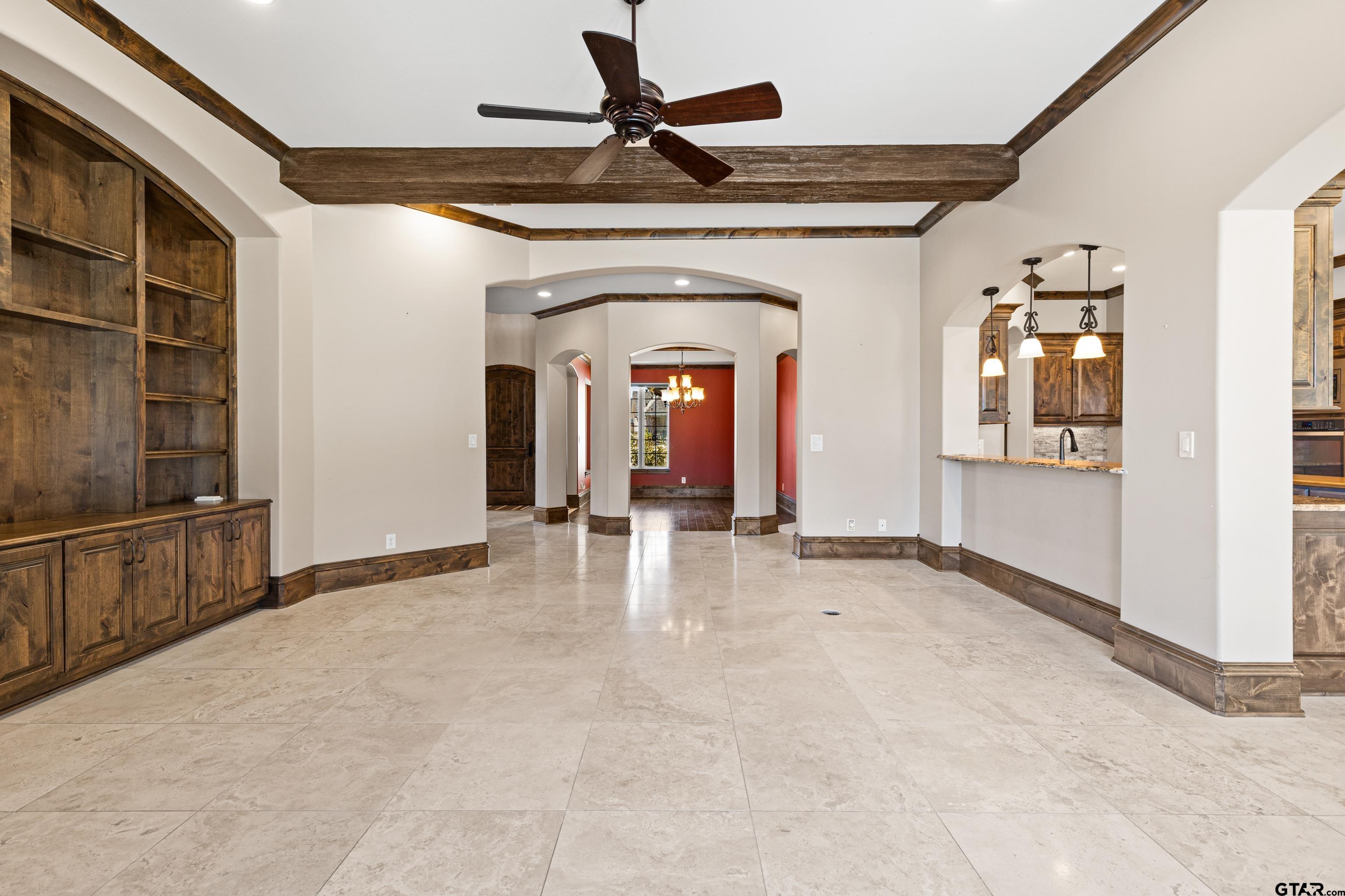 4314 Pecan Ridge Crossing Longview, TX 75605 - Photo 16 of 47 a view of livingroom with hardwood floor and ceiling fan