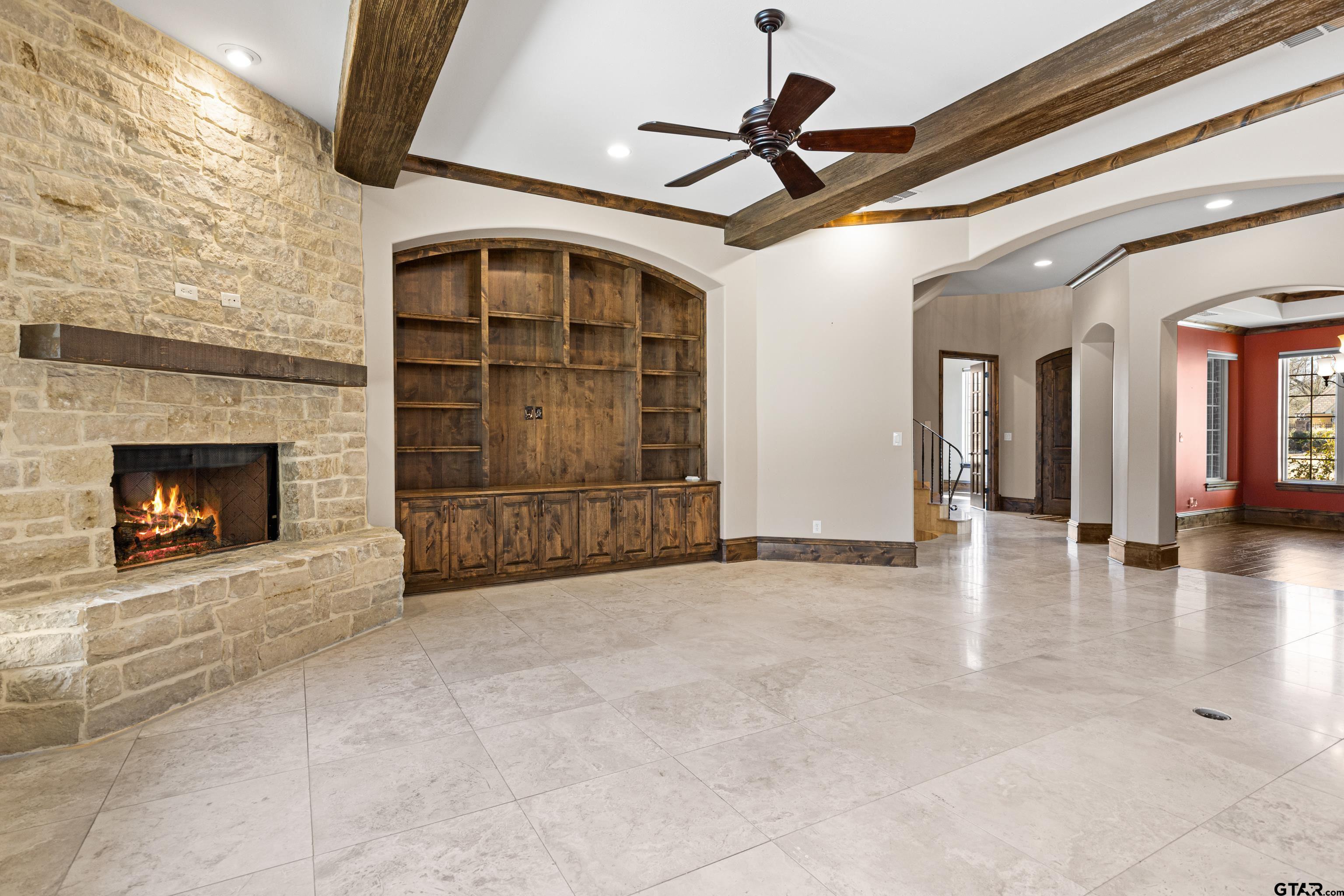 4314 Pecan Ridge Crossing Longview, TX 75605 - Photo 17 of 47 a view of a livingroom with a fireplace and window