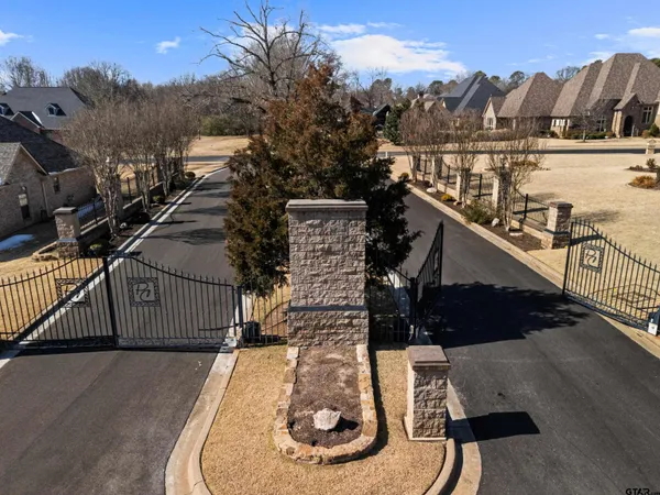 an aerial view of a house with swimming pool and mountain view