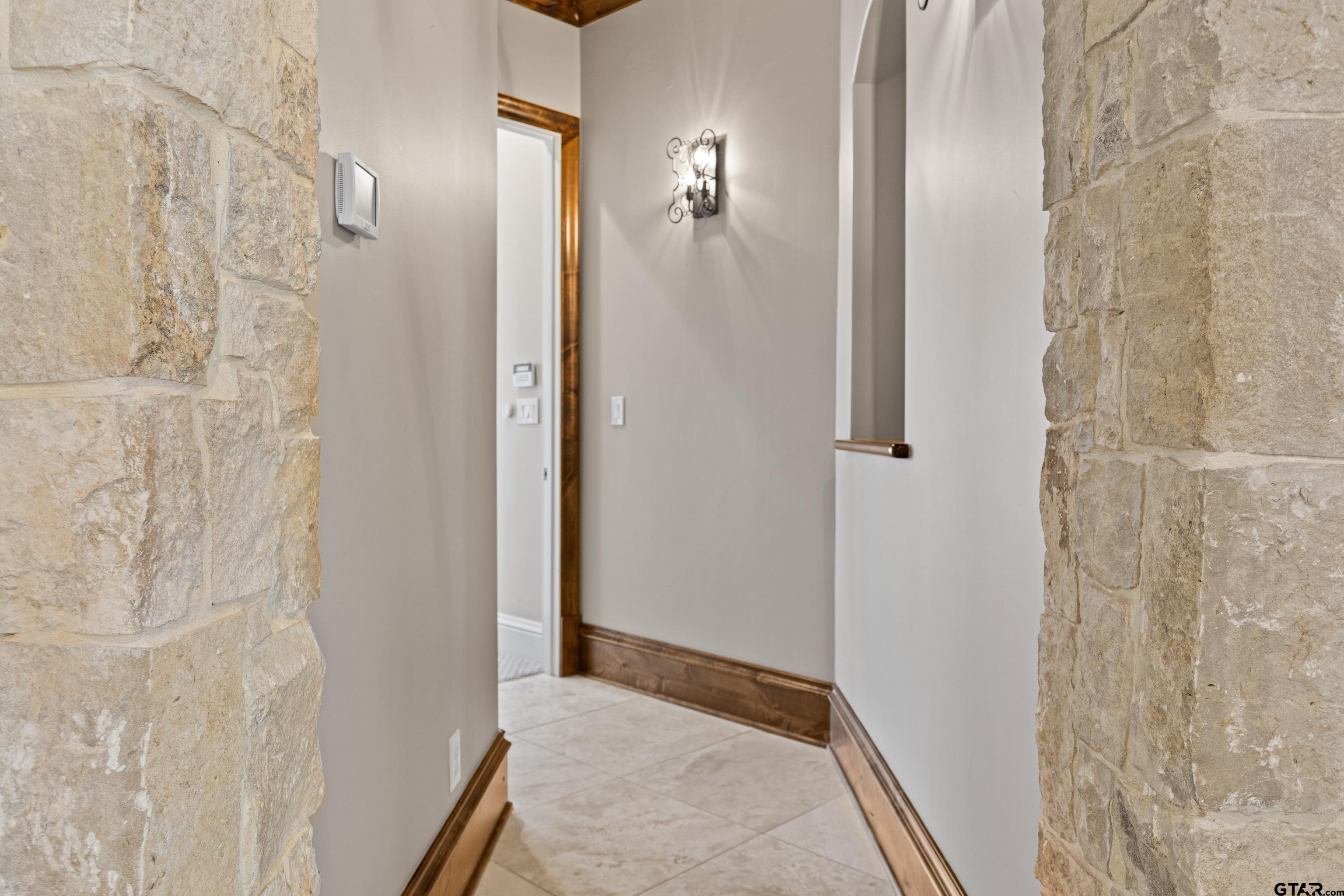 4314 Pecan Ridge Crossing Longview, TX 75605 - Photo 24 of 47 a view of a bathroom from a hallway