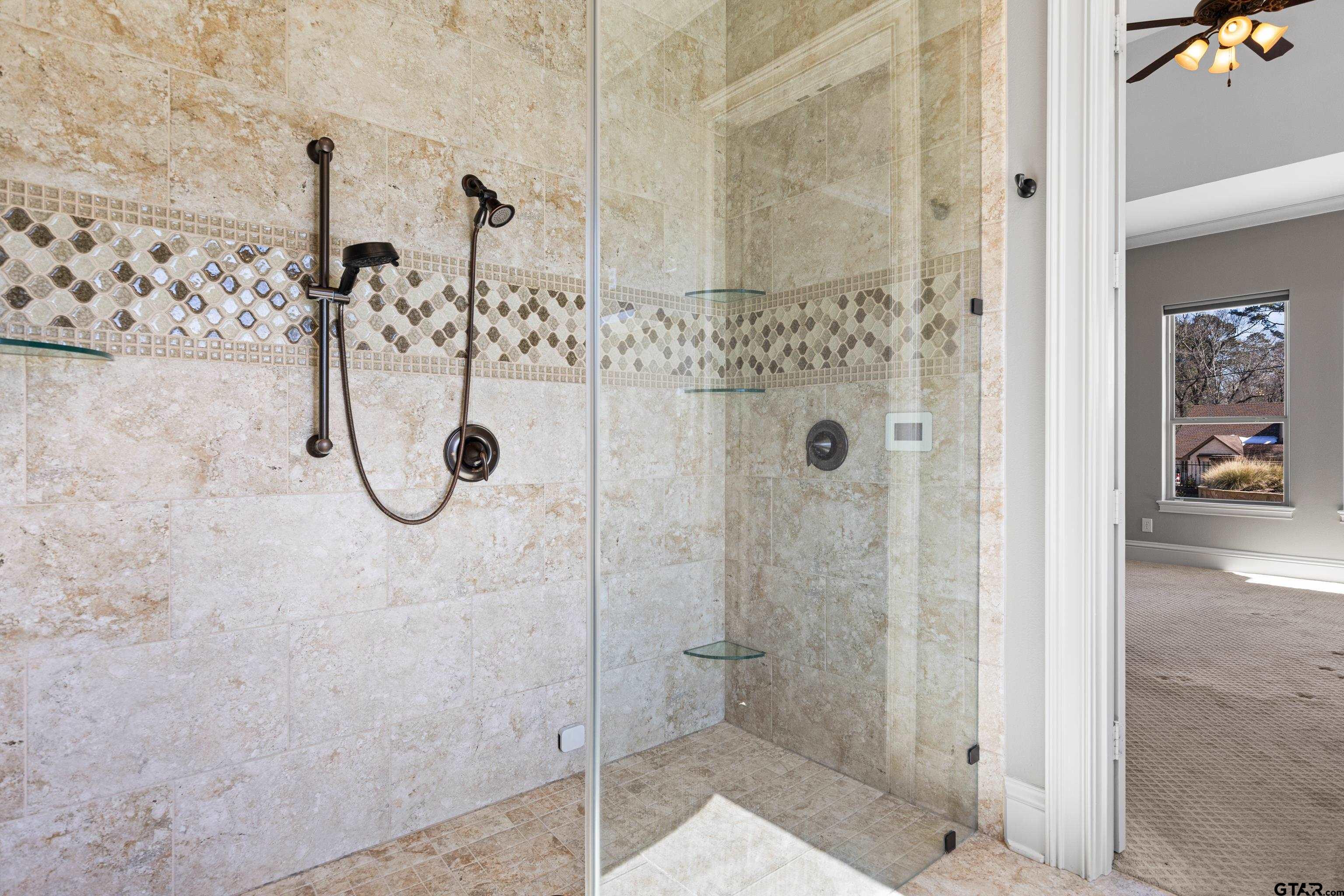 4314 Pecan Ridge Crossing Longview, TX 75605 - Photo 26 of 47 a bathroom with a shower