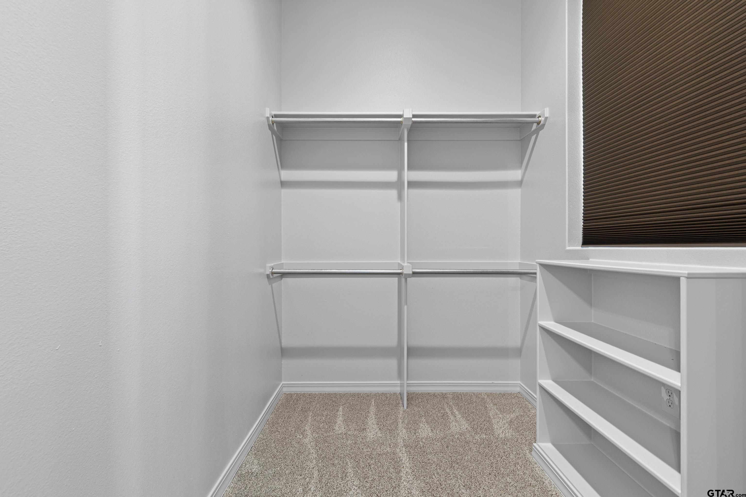 4314 Pecan Ridge Crossing Longview, TX 75605 - Photo 36 of 47 a view of an empty walk in closet