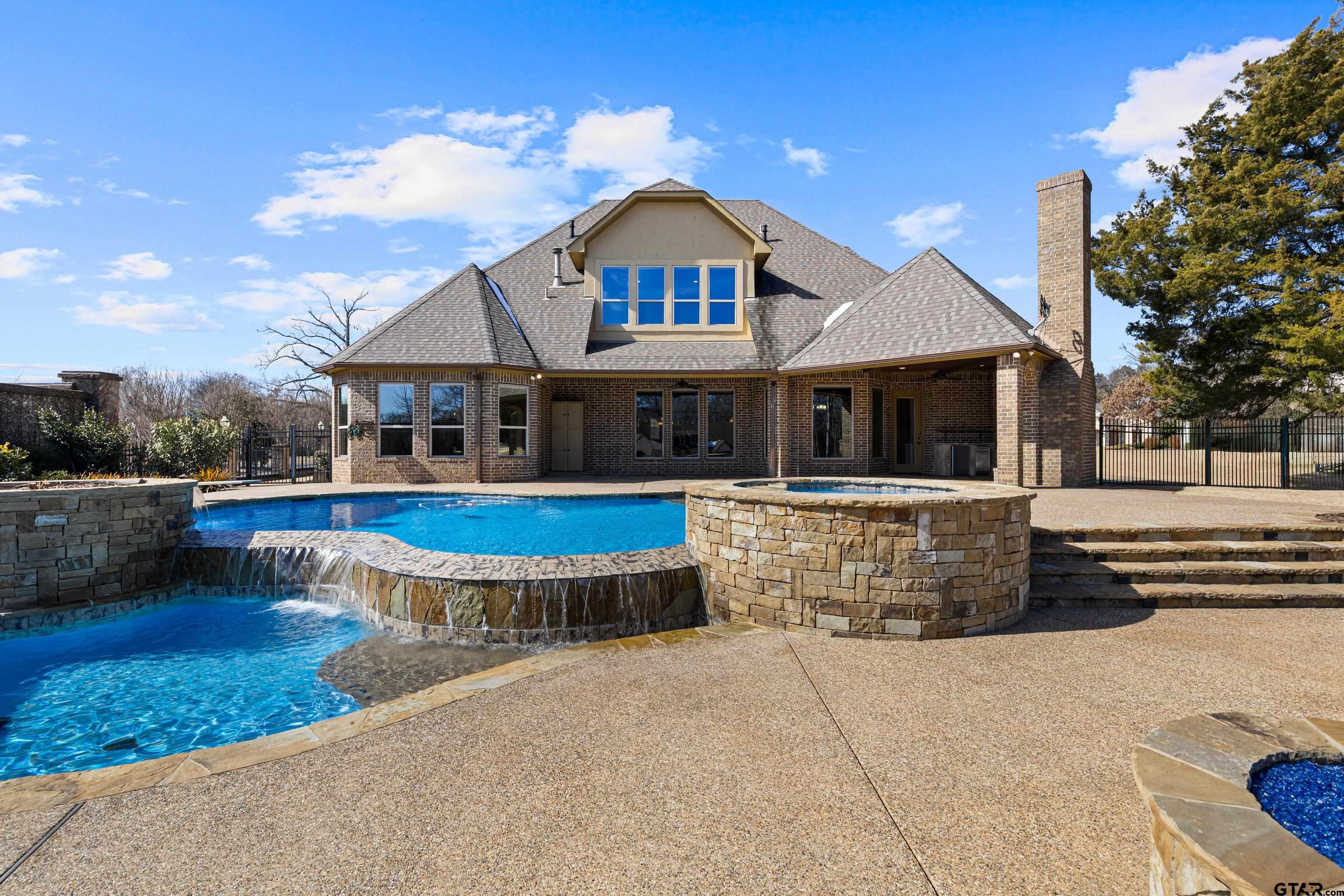 4314 Pecan Ridge Crossing Longview, TX 75605 - Photo 42 of 47 a front view of a house with swimming pool
