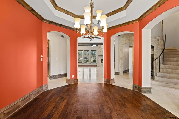 a view of livingroom with hardwood floor and ceiling fan
