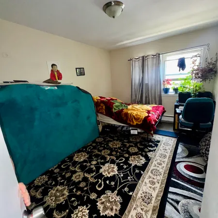 a living room with furniture and a gate