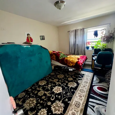 a living room with furniture and a gate