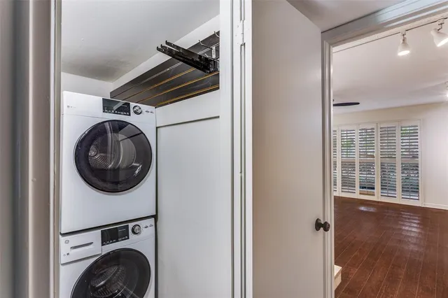 a view of a hallway with washer and dryer