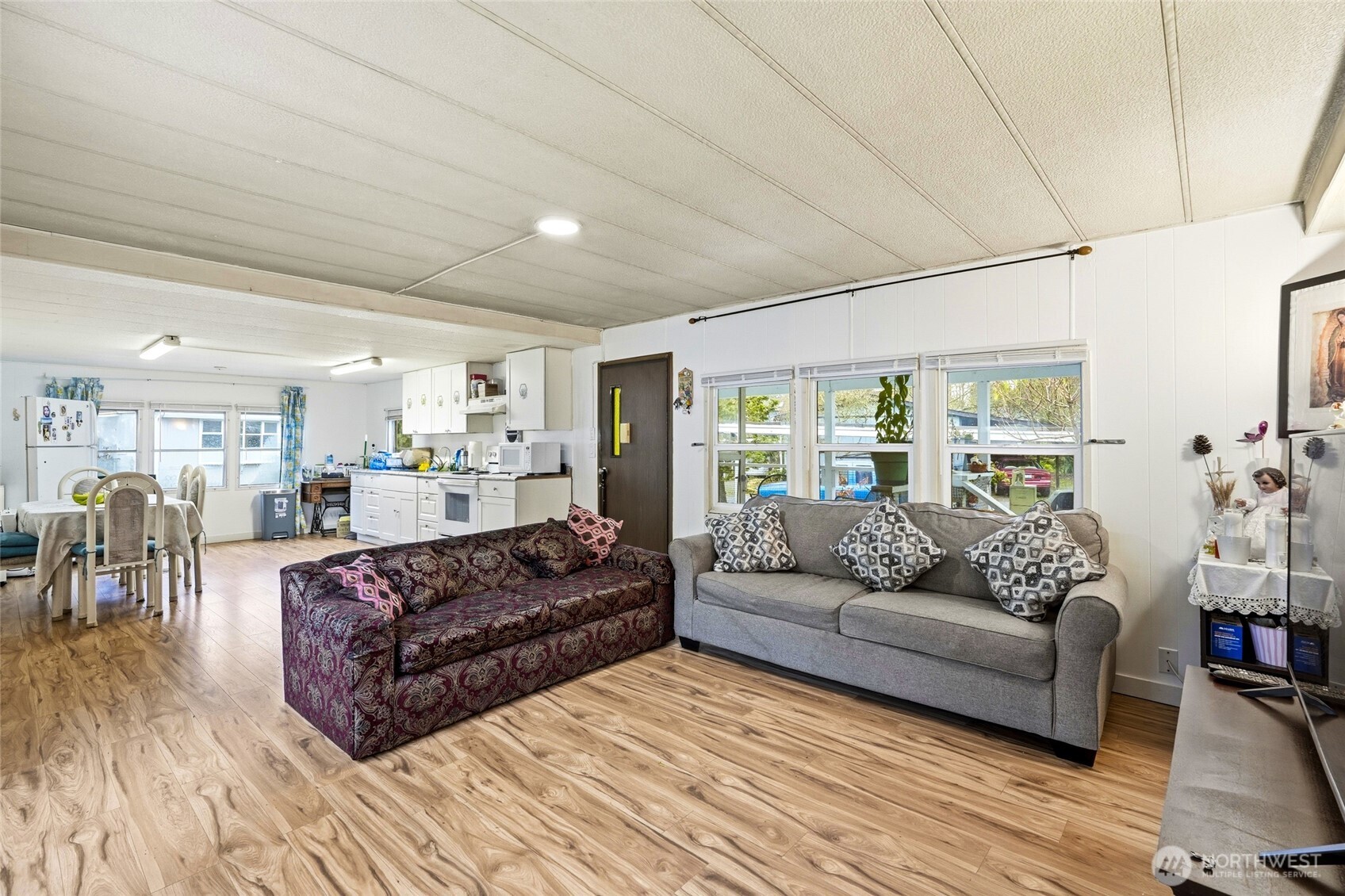 11330 East Riverside Drive, Unit 25 Bothell, WA 98011 - Photo 13 of 19 a living room with furniture and a wooden floor