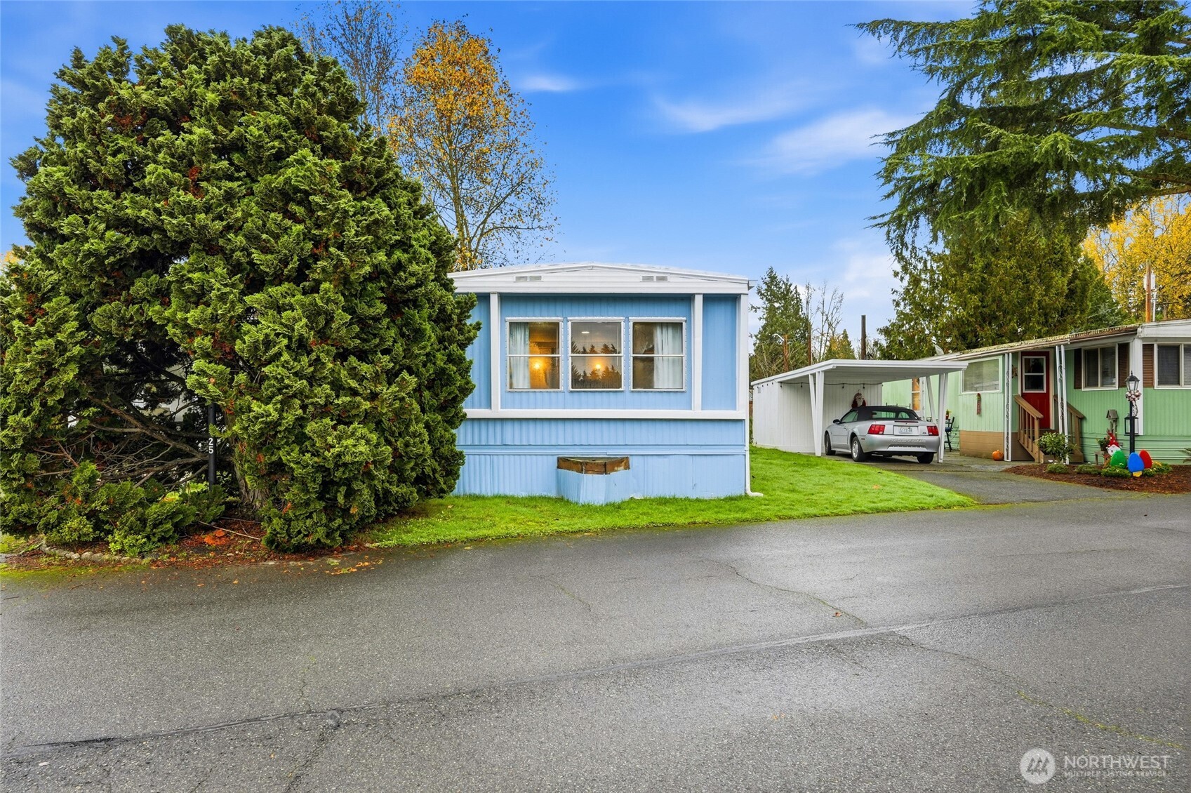 11330 East Riverside Drive, Unit 25 Bothell, WA 98011 - Photo 2 of 19 a house view with a outdoor space