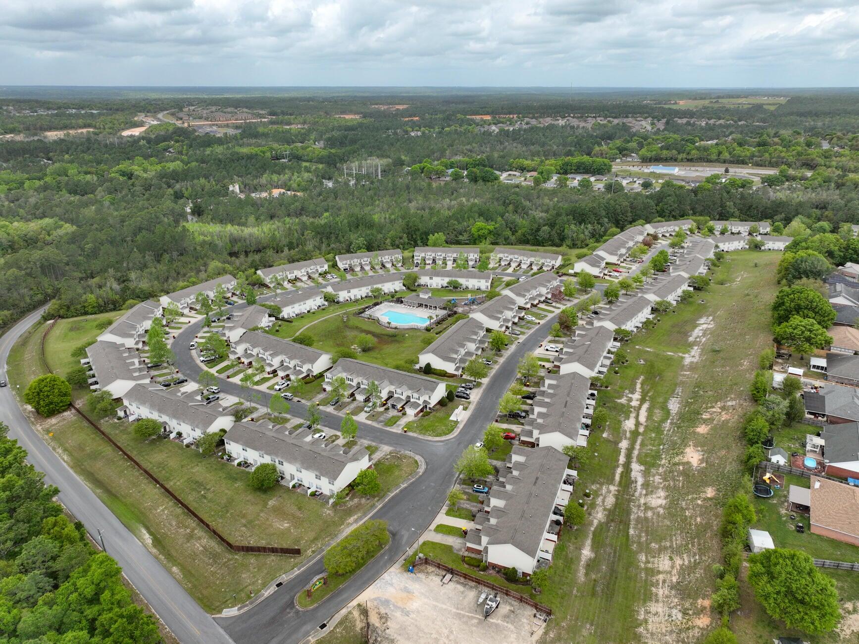 562 Wingspan Way Crestview, FL 32536 - Photo 12 of 12 an aerial view of residential houses with outdoor space