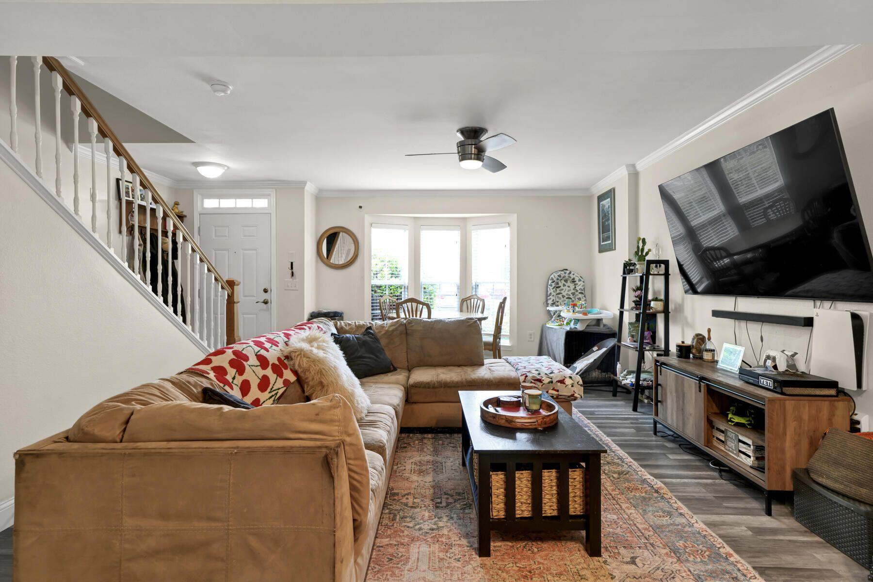 562 Wingspan Way Crestview, FL 32536 - Photo 4 of 12 a living room with furniture and a flat screen tv