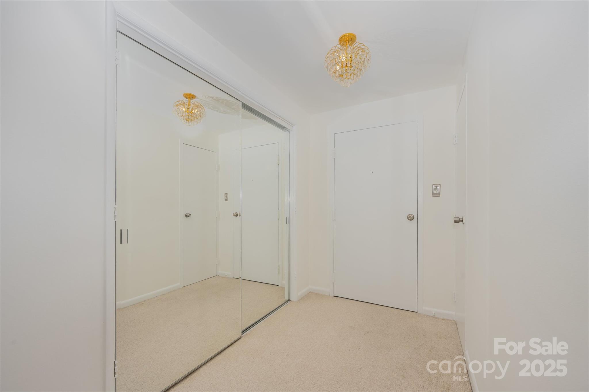 1300 Reece Road, Unit 302 Charlotte, NC 28209 - Photo 3 of 23 a view of an empty room