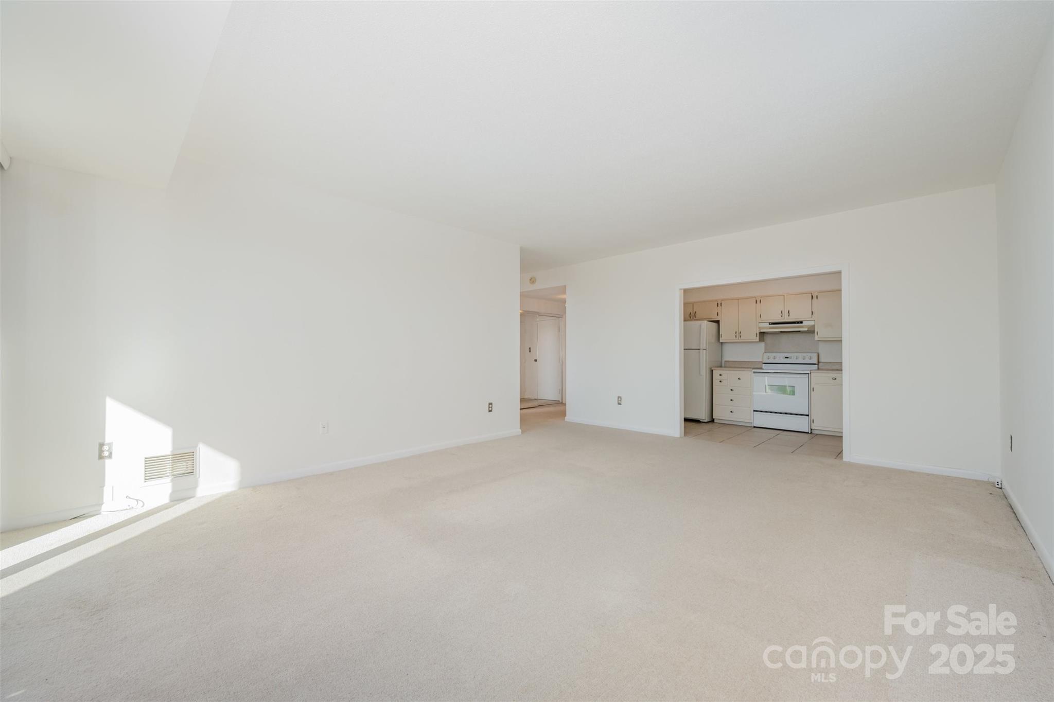 1300 Reece Road, Unit 302 Charlotte, NC 28209 - Photo 8 of 23 a view of a room with an empty space