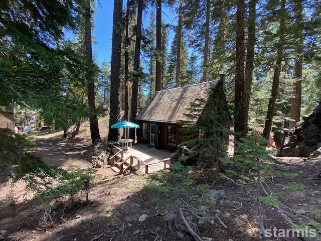 31960 Kit Carson Road, Unit 54 Pioneer, CA 95666 - Photo 3 of 21 a view of a house with a tree back yard