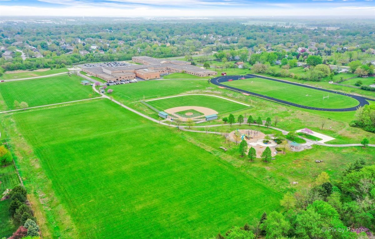 724 Ridgelawn Trail Batavia, IL 60510 - Photo 27 of 32 an aerial view of huge green field with lots of green space