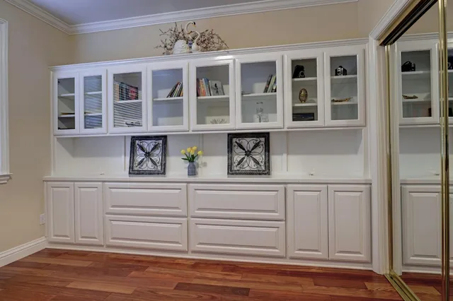 a kitchen with a cabinets and appliances