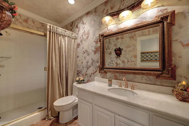 a living room with furniture and a dresser