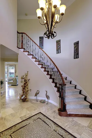 a view of walk in closet with clothes